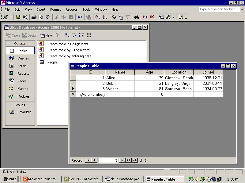 Access 2002 with a simple database. Notice MDI windows create taskbar buttons.